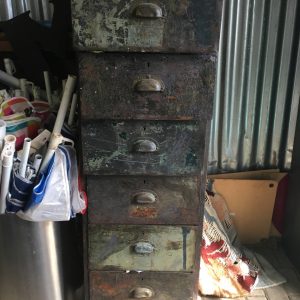 worn filing cabinet character
